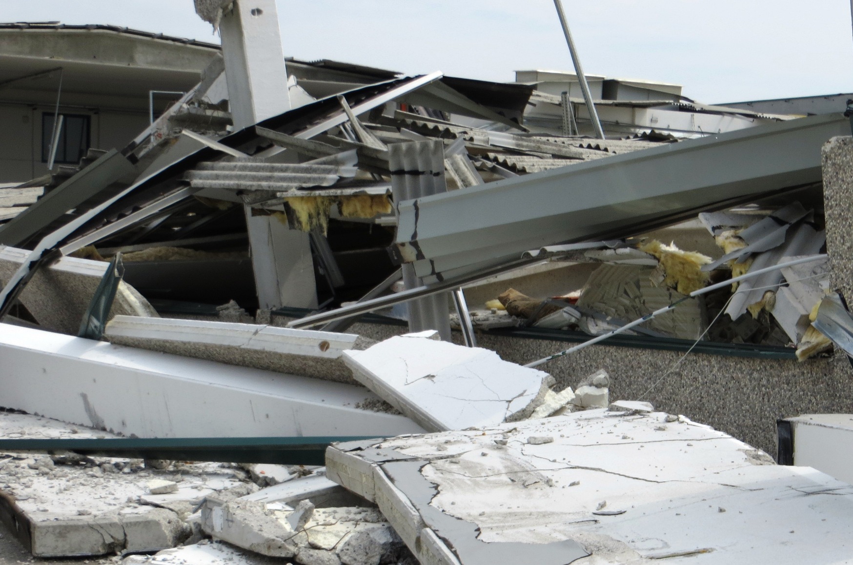 surveying a collapsed building